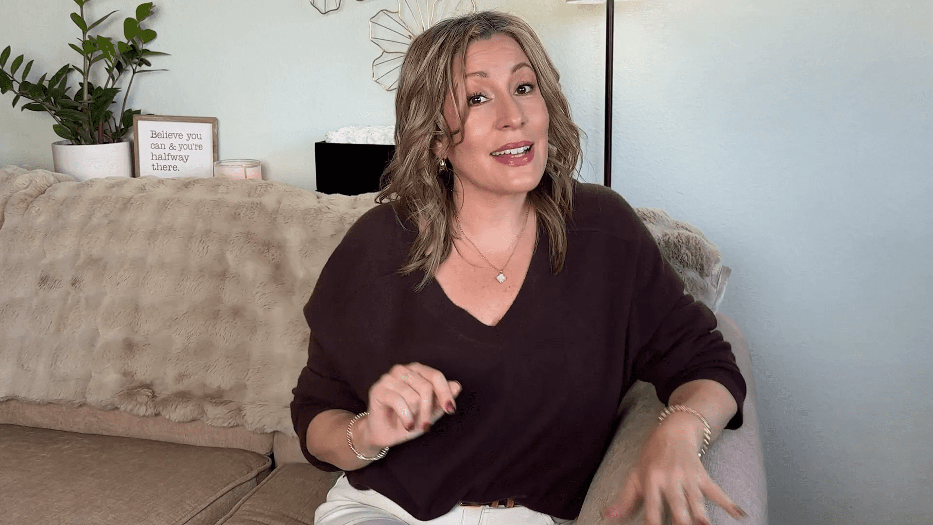 Hands applying castor oil to dry skin